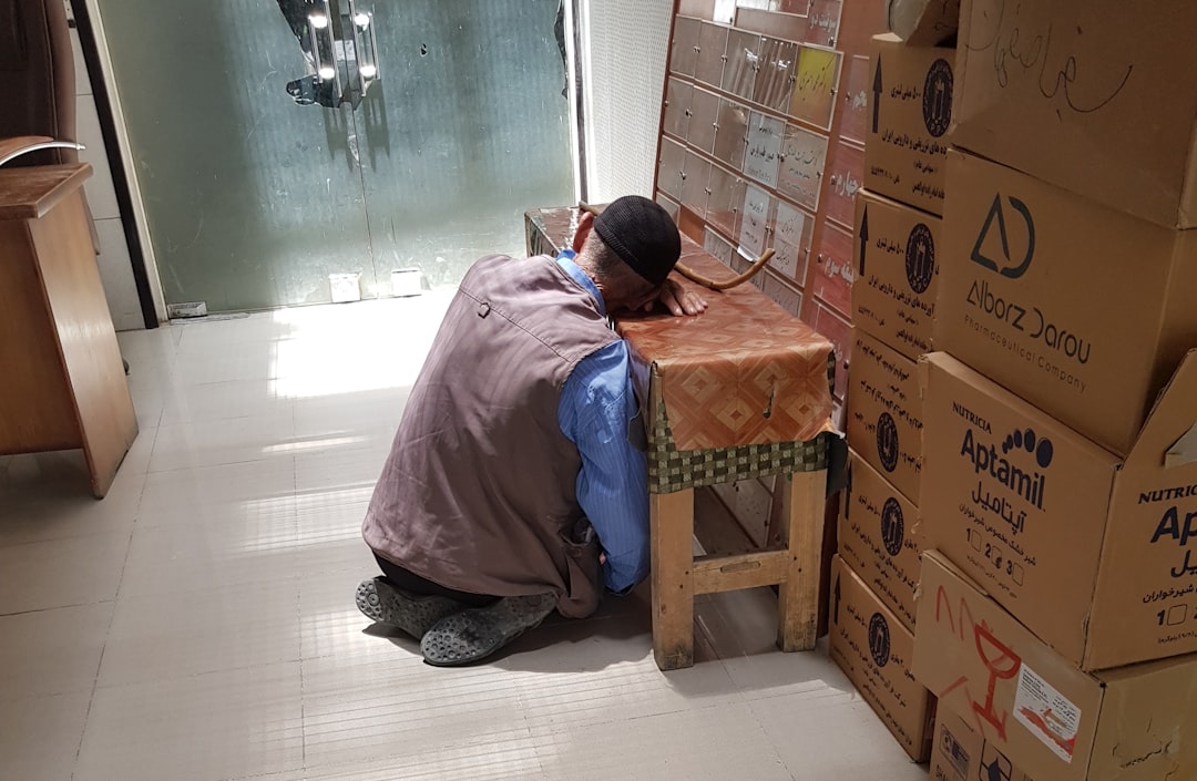 man sitting on floor